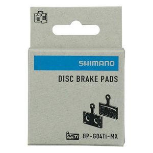 Pastillas de freno Shimano G04Ti-MX y muelle con pasador de aletas