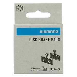 Pastillas de freno de resina Shimano G05A-RX y muelle con pasador de aletas